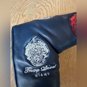 Trump Doral, navy blue putter cover, missing ball marker
